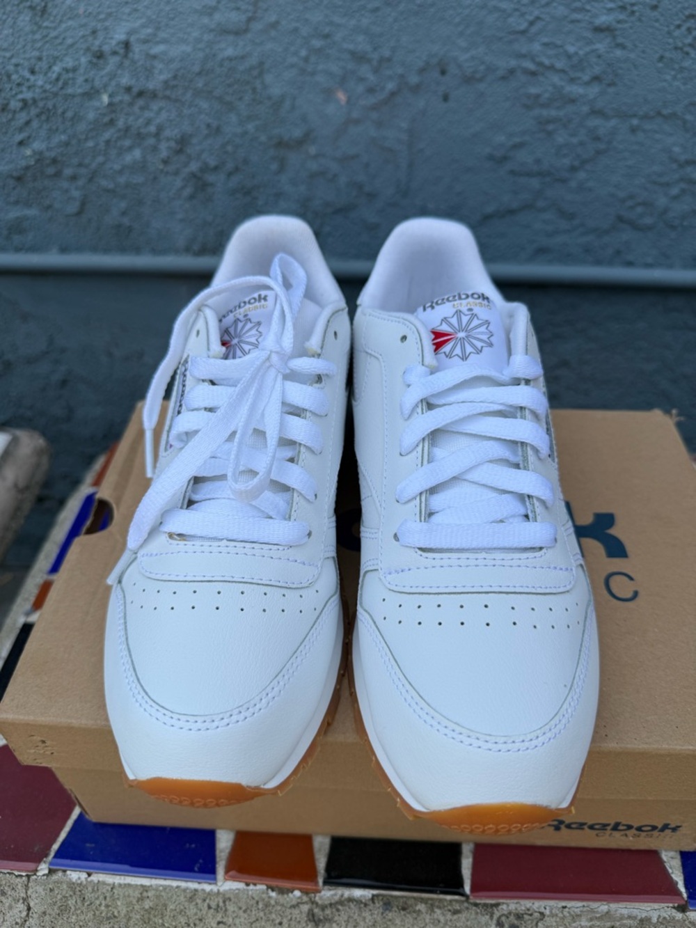 Reebok White Sneakers with Orange Accents